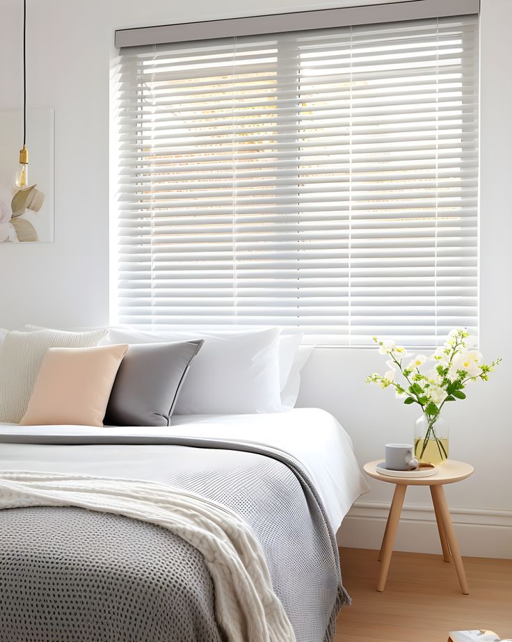 serenity in white venetian blinds for your bedroom